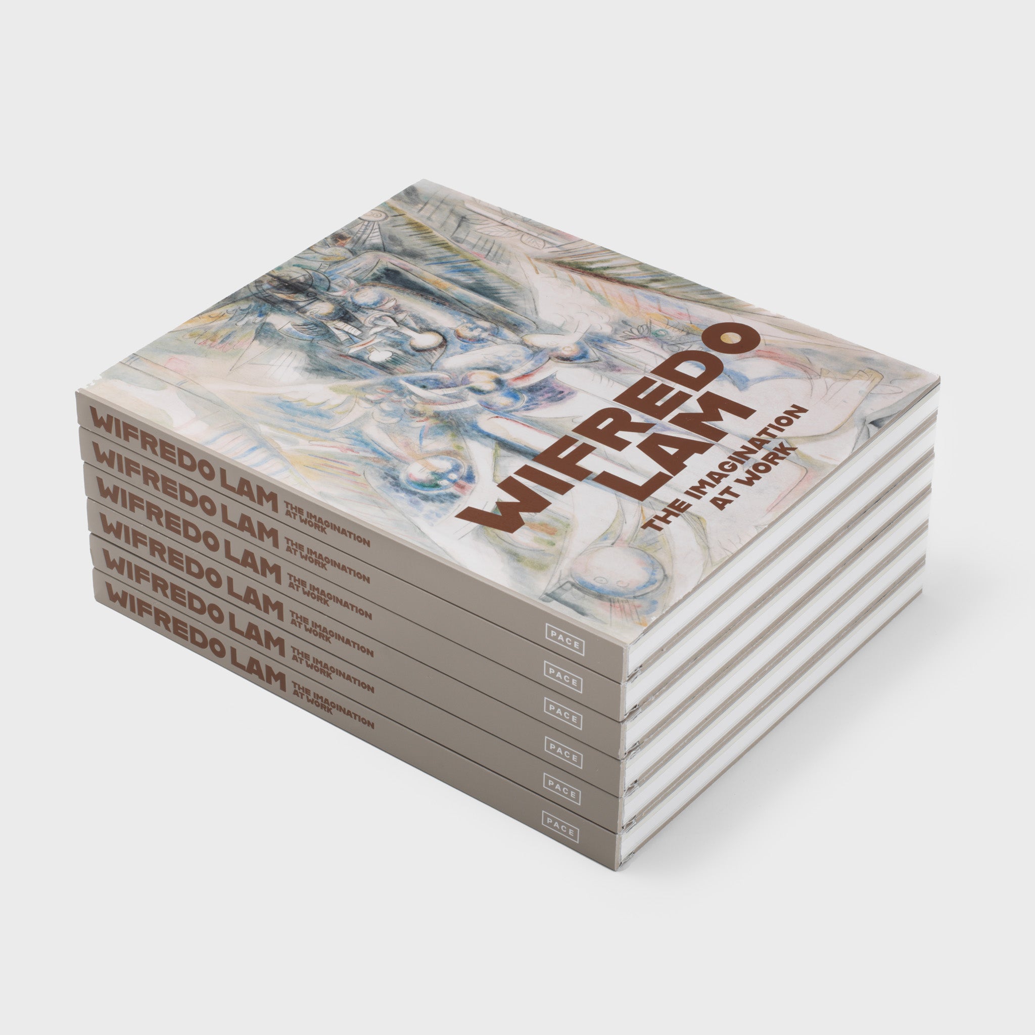 There are six Wifredo Lam The Imagination at Work books stacked on top of each other.