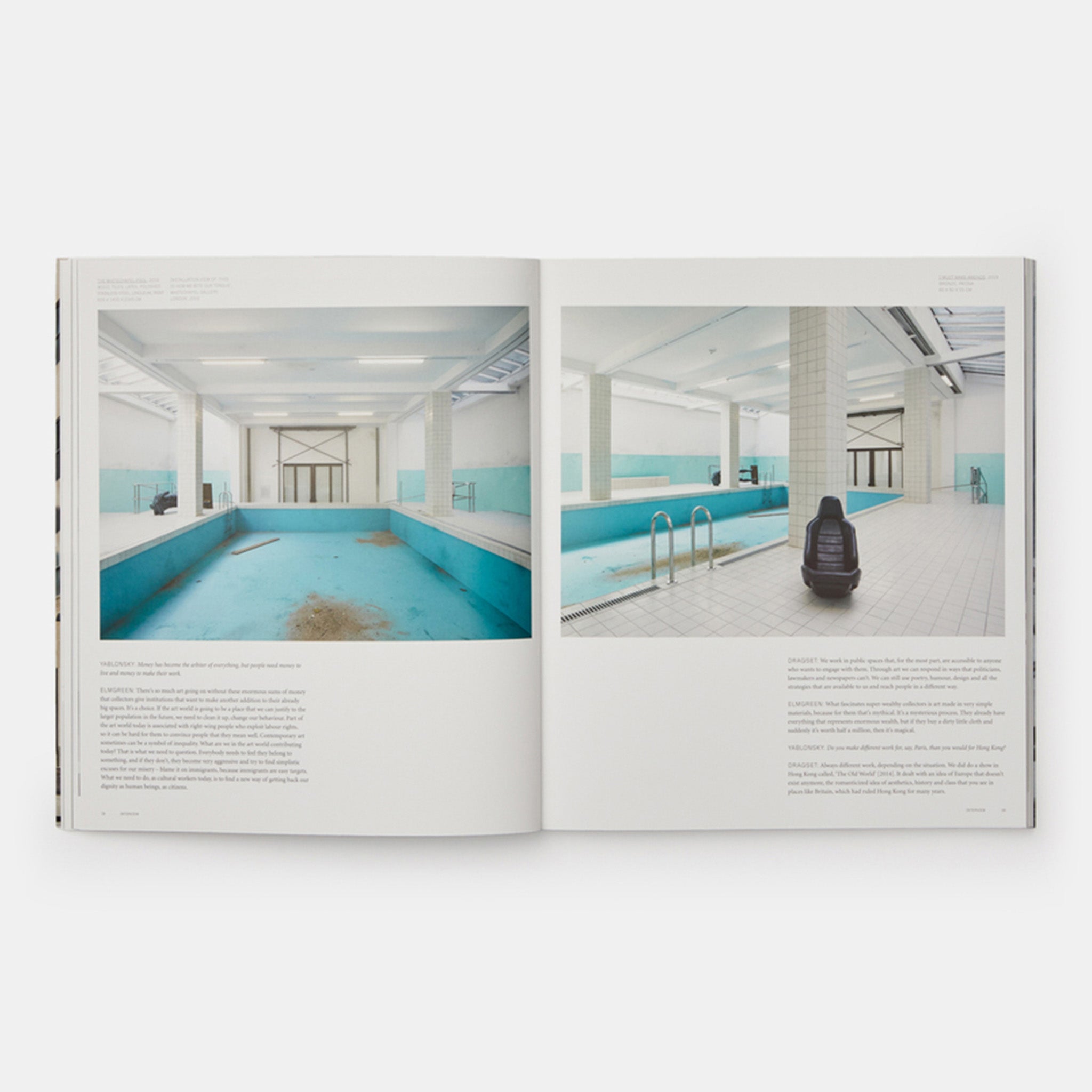 The book is open to two pages with images of an indoor pool on both pages. There is black text underneath both.
