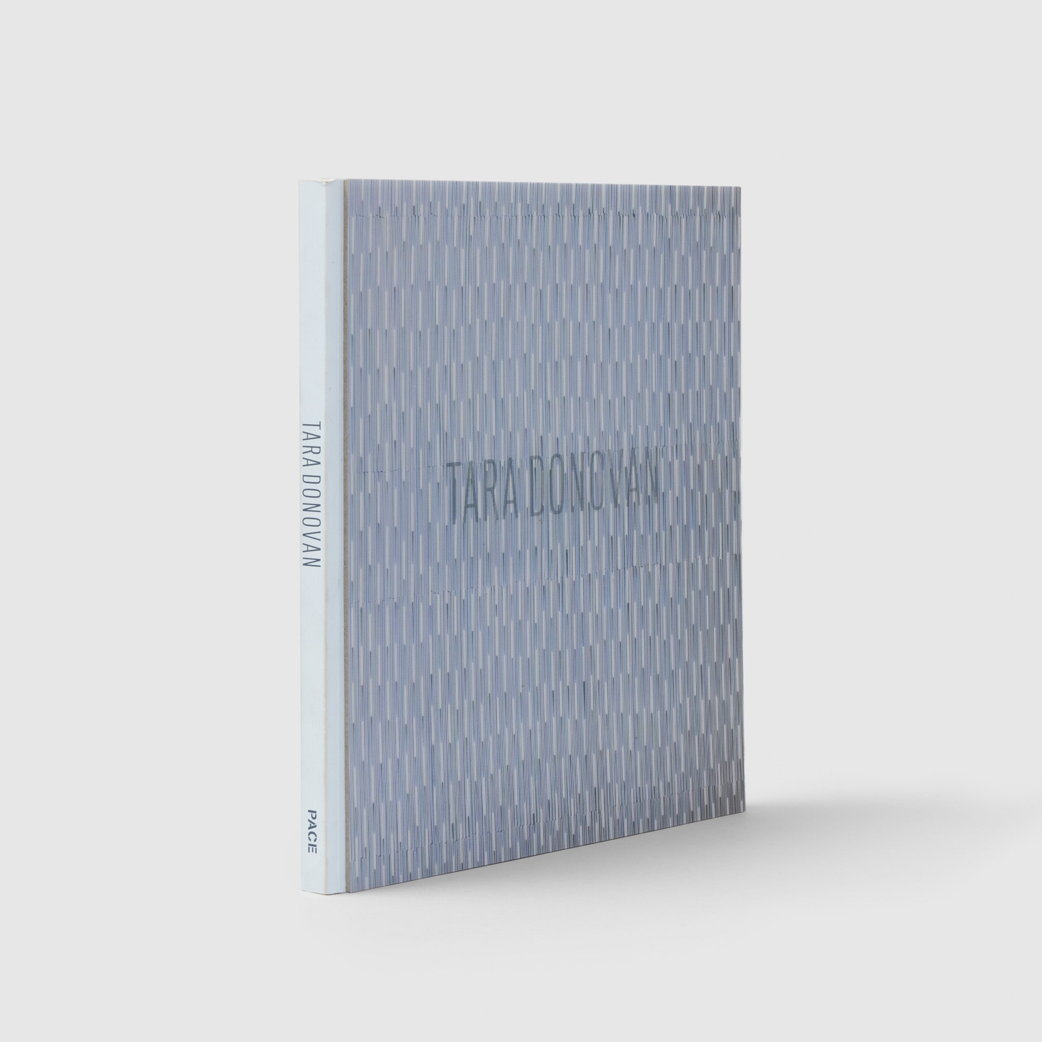 Tara Donvan. The cover is blue and textured with blue text. The spine is light blue.