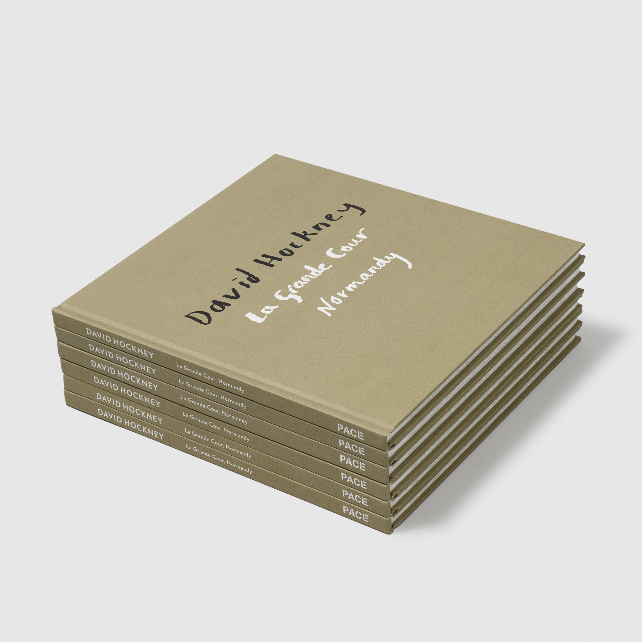 Six copies of David Hockney La Grande Cour Normandy are stacked on top of each other.