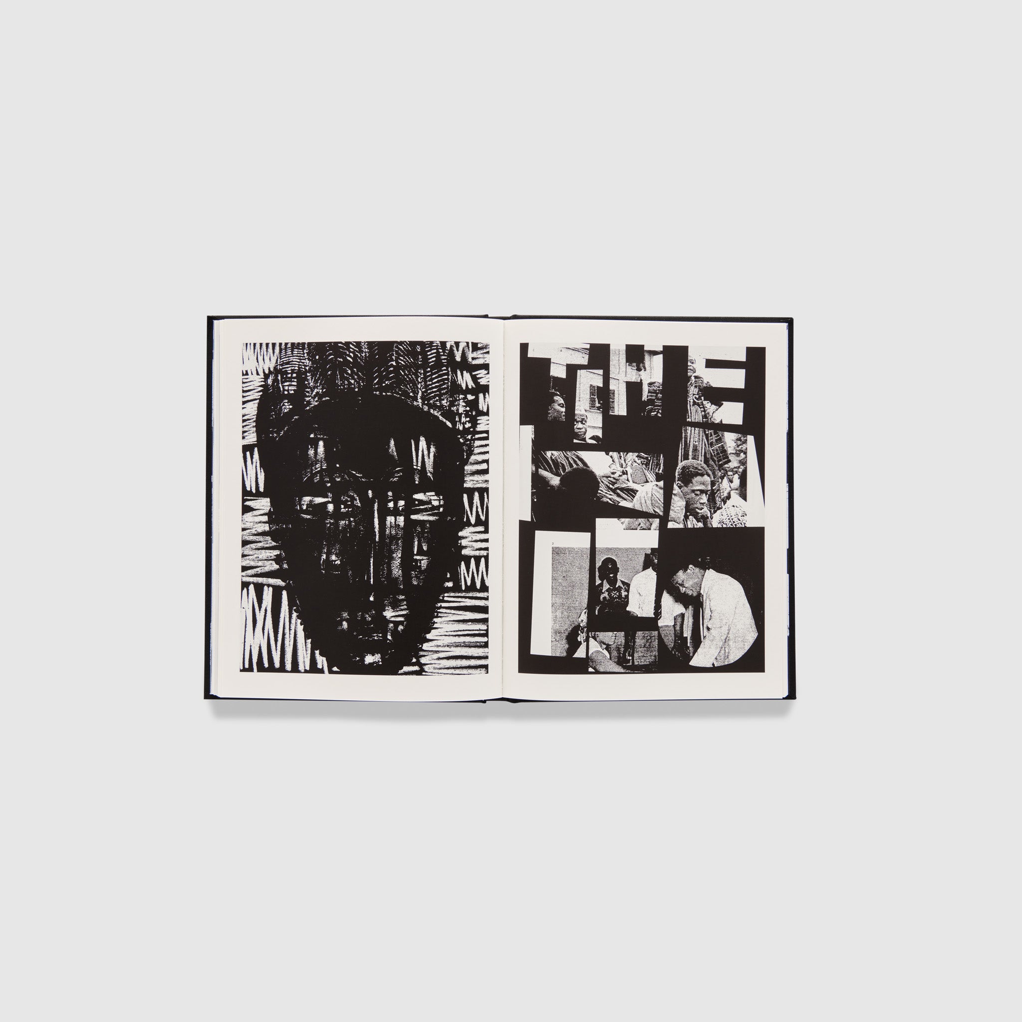 The book is open to two pages with the artists black and white works on both pages.