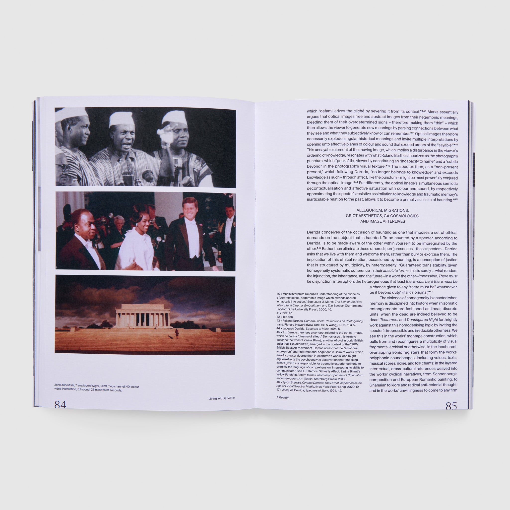 The book is open to two pages. The left page has three photographs featuring work by the artist John Akomfrah. The right page has an essay with black text and a white background.