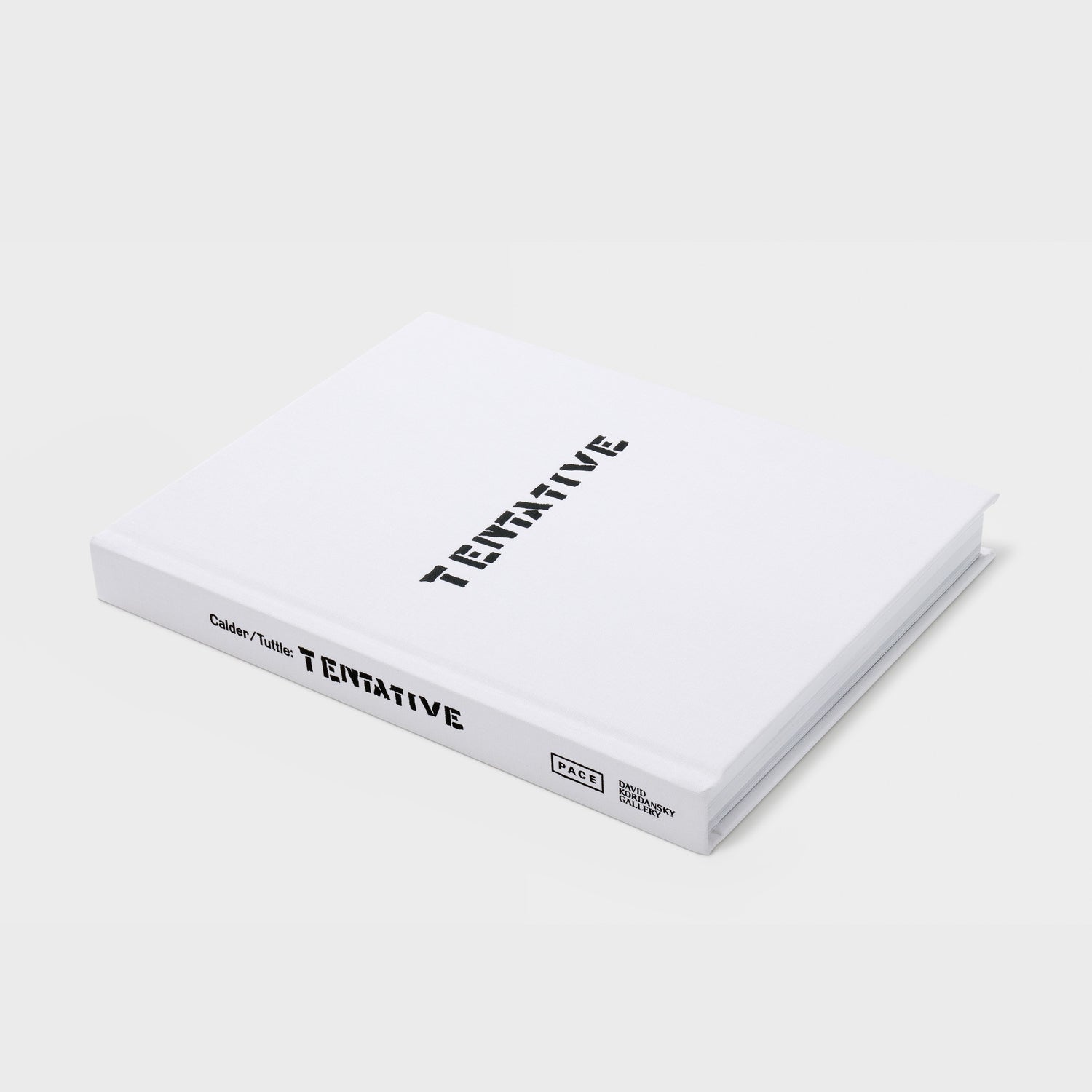 Calder Tuttle Tentative is laying flat on a white background. The book has a white fabric cover and black text.