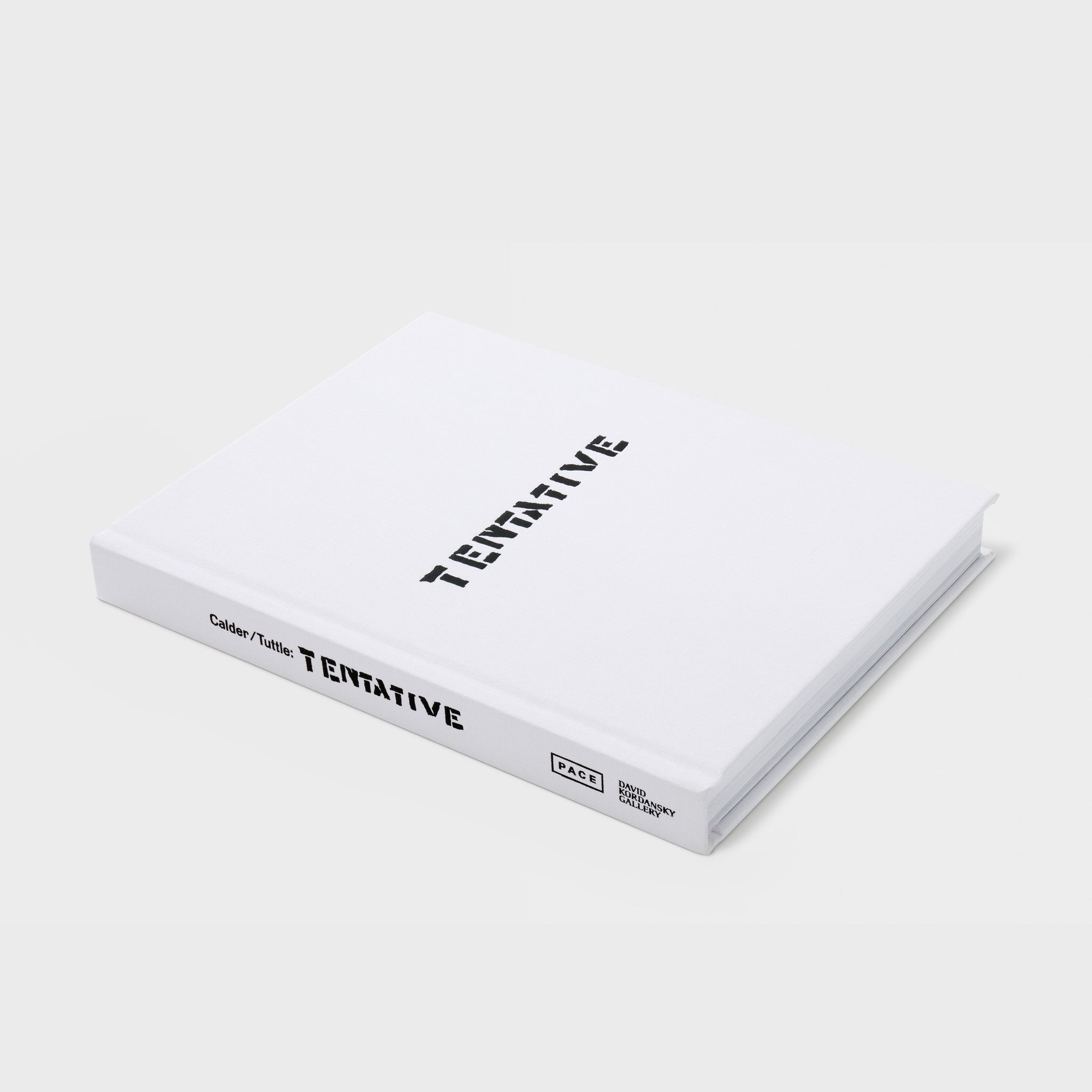 Calder Tuttle Tentative is laying flat on a white background. The book has a white fabric cover and black text.