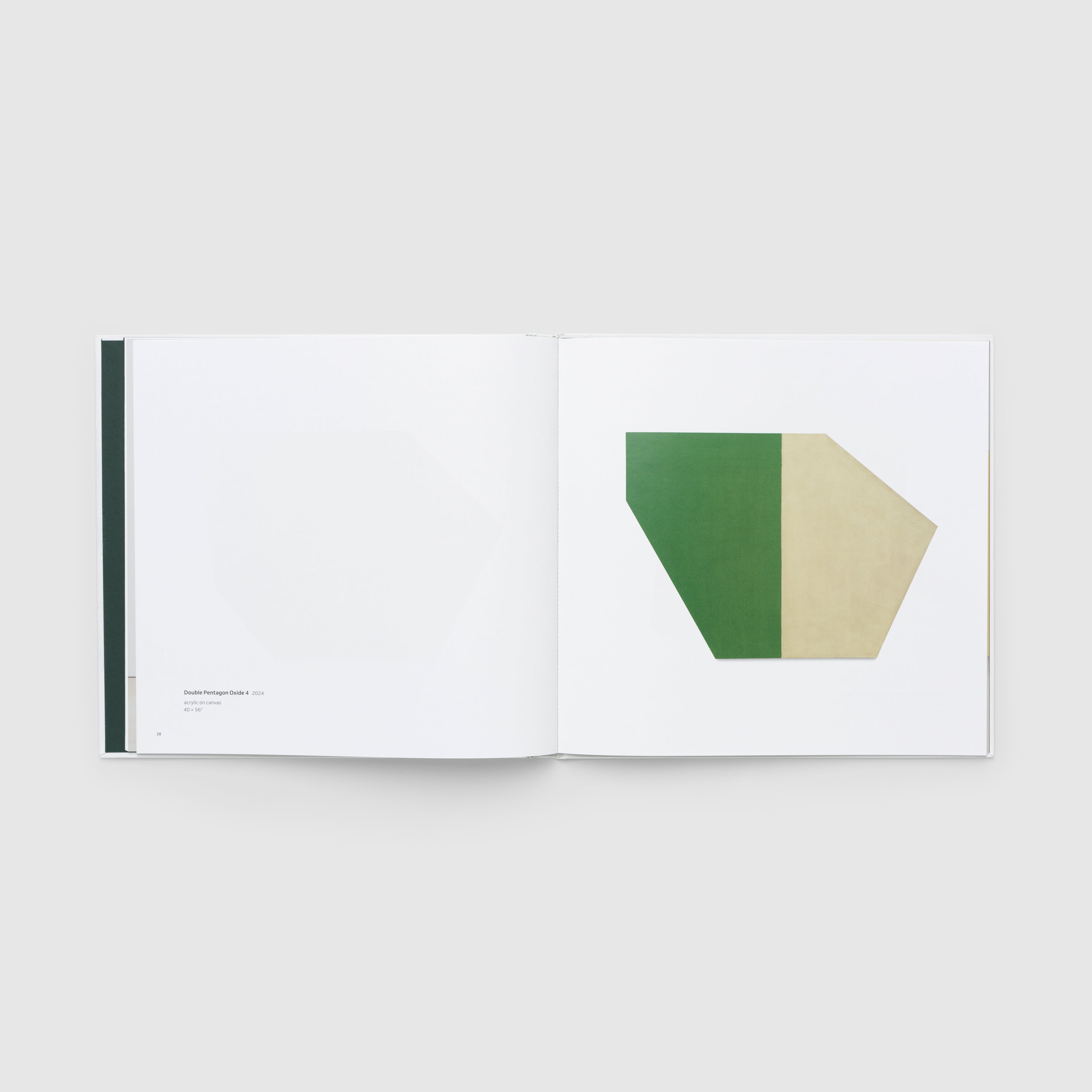 Open book with geometric shapes on a white background