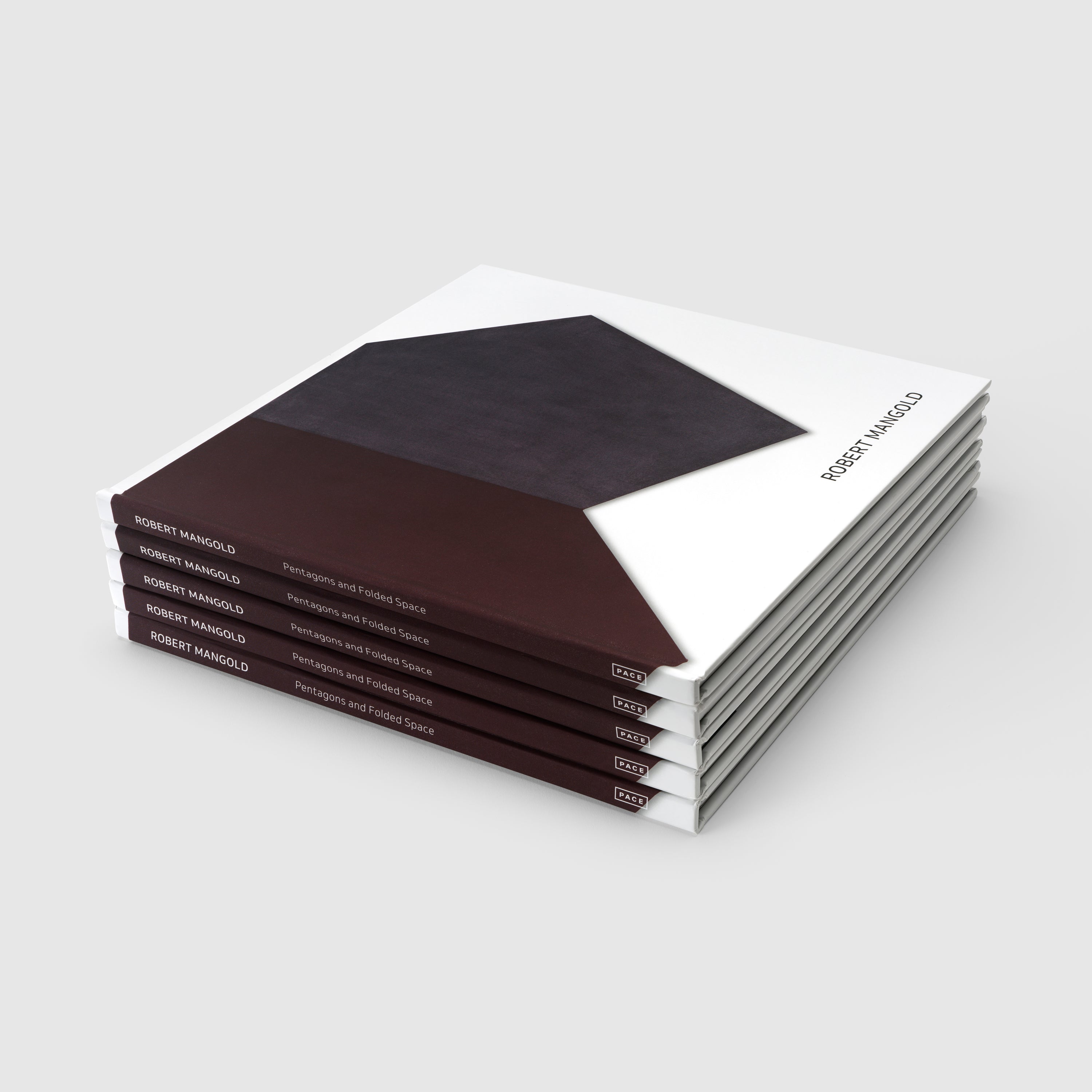 Stack of books with geometric design on a white background