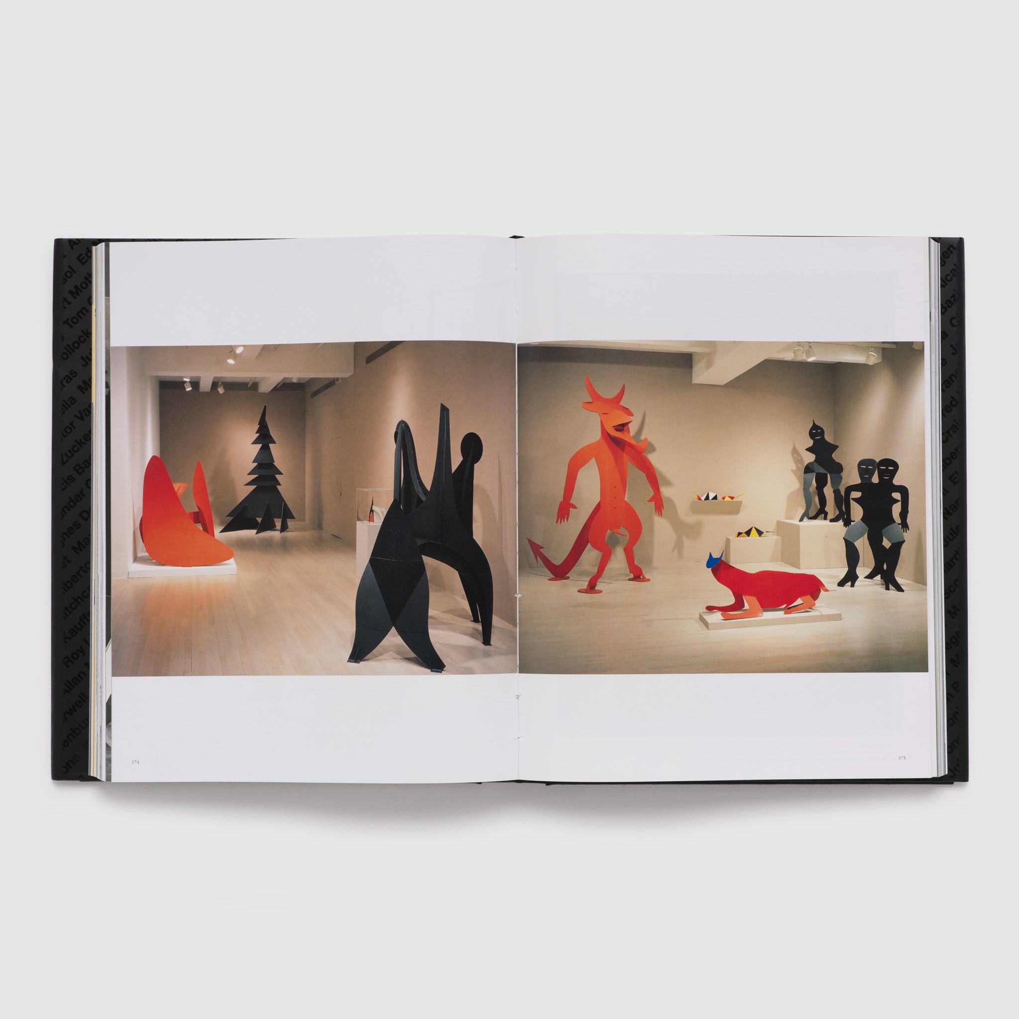 The book is open to two pages and there is a photograph of an exhibition of Alexander Calder&