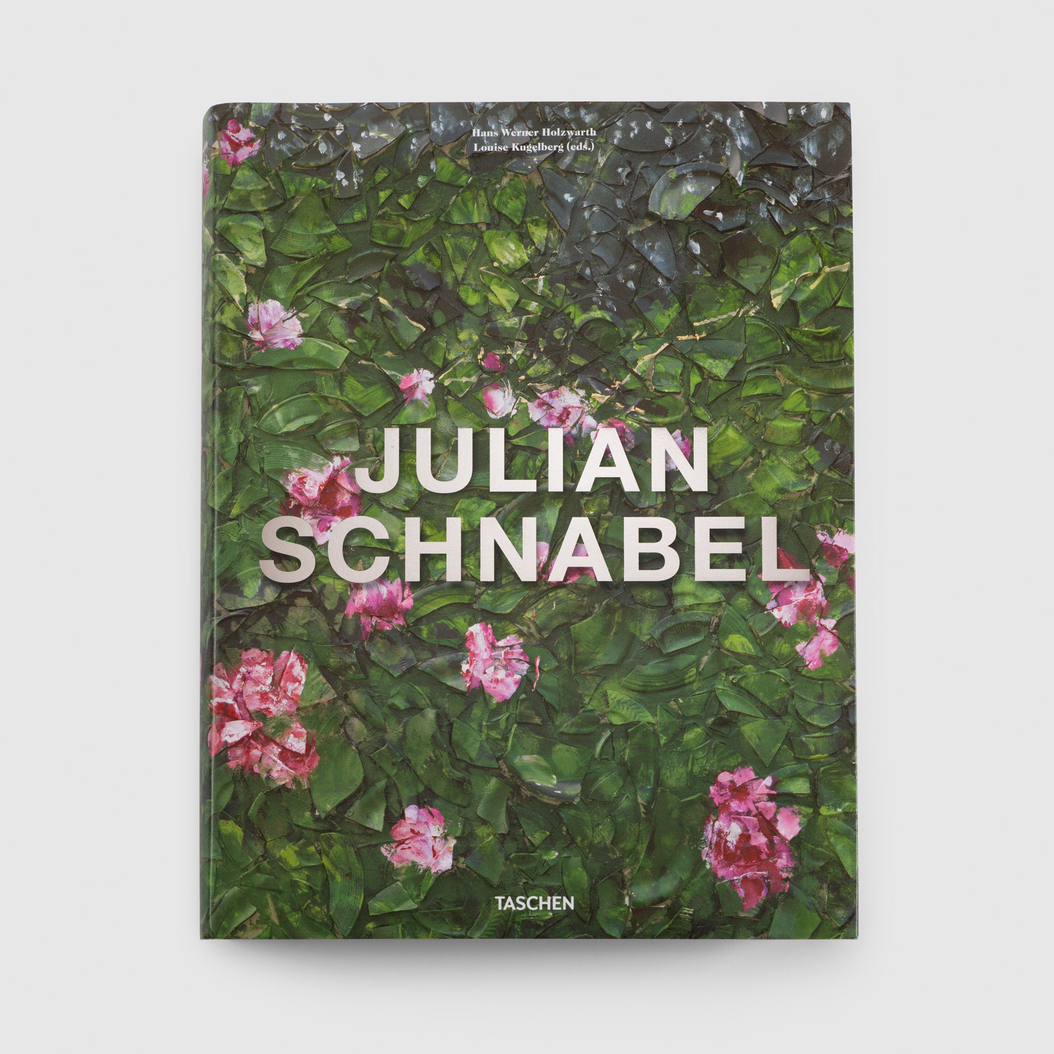 Julian Schnabel. The cover has an image of his plate works with a green background and pink flowers.