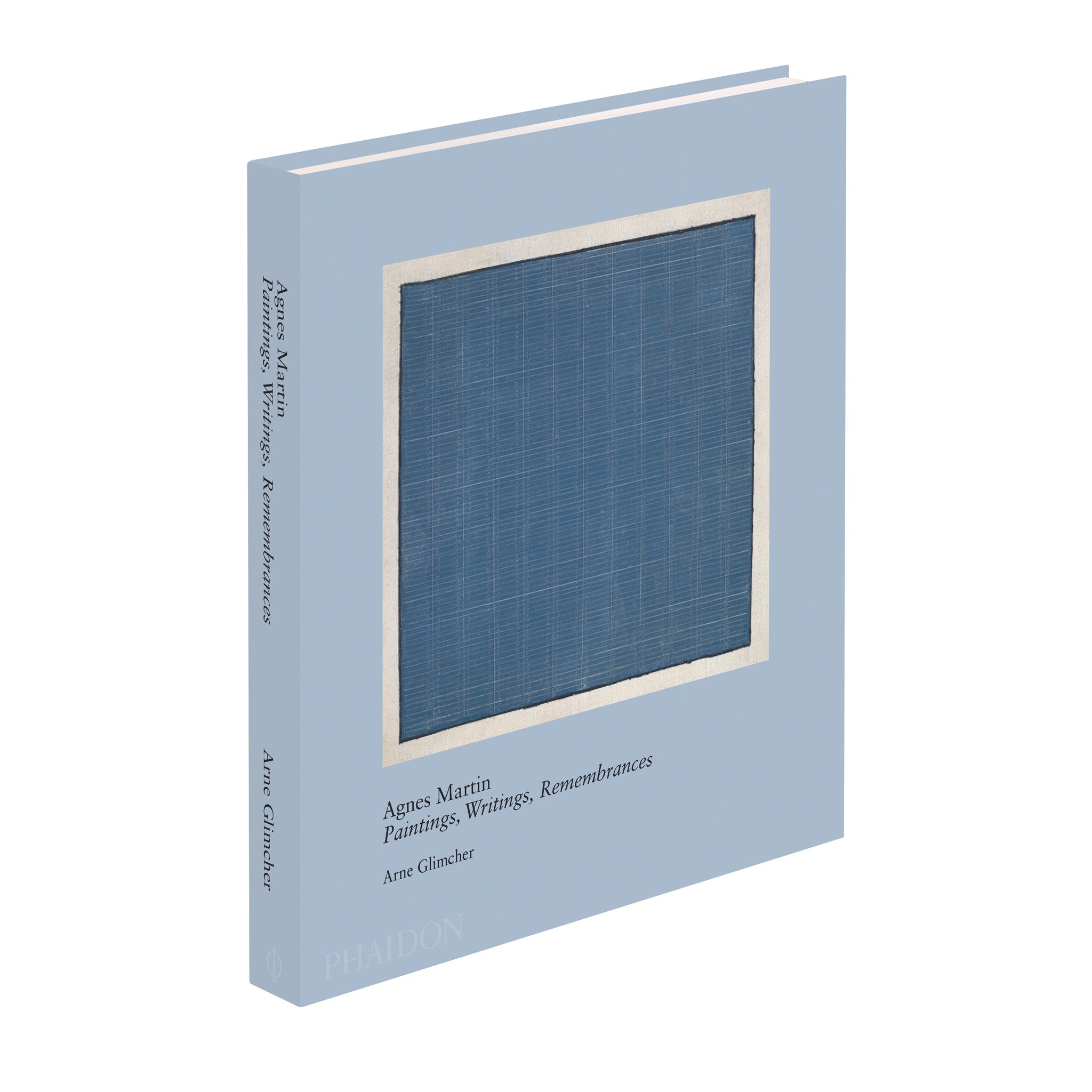 Agnes Martin Paintings, Writings, Remembrances by Arne Glimcher. The blue book is upright and angled, with a blue Agnes Martin painting on the cover.