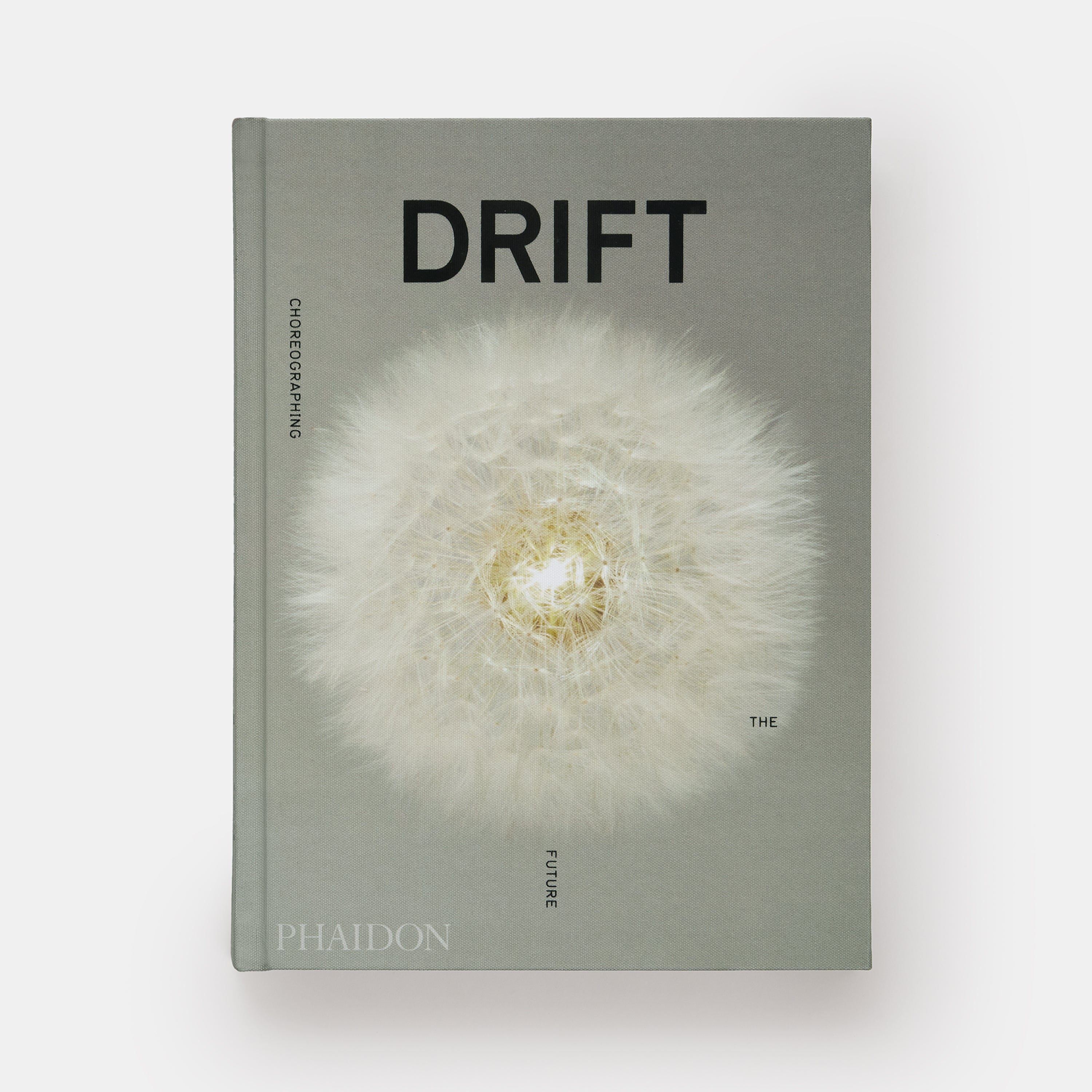 Drift Choreographing the Future. The book has an olive toned cover with a photo of a dandelion.