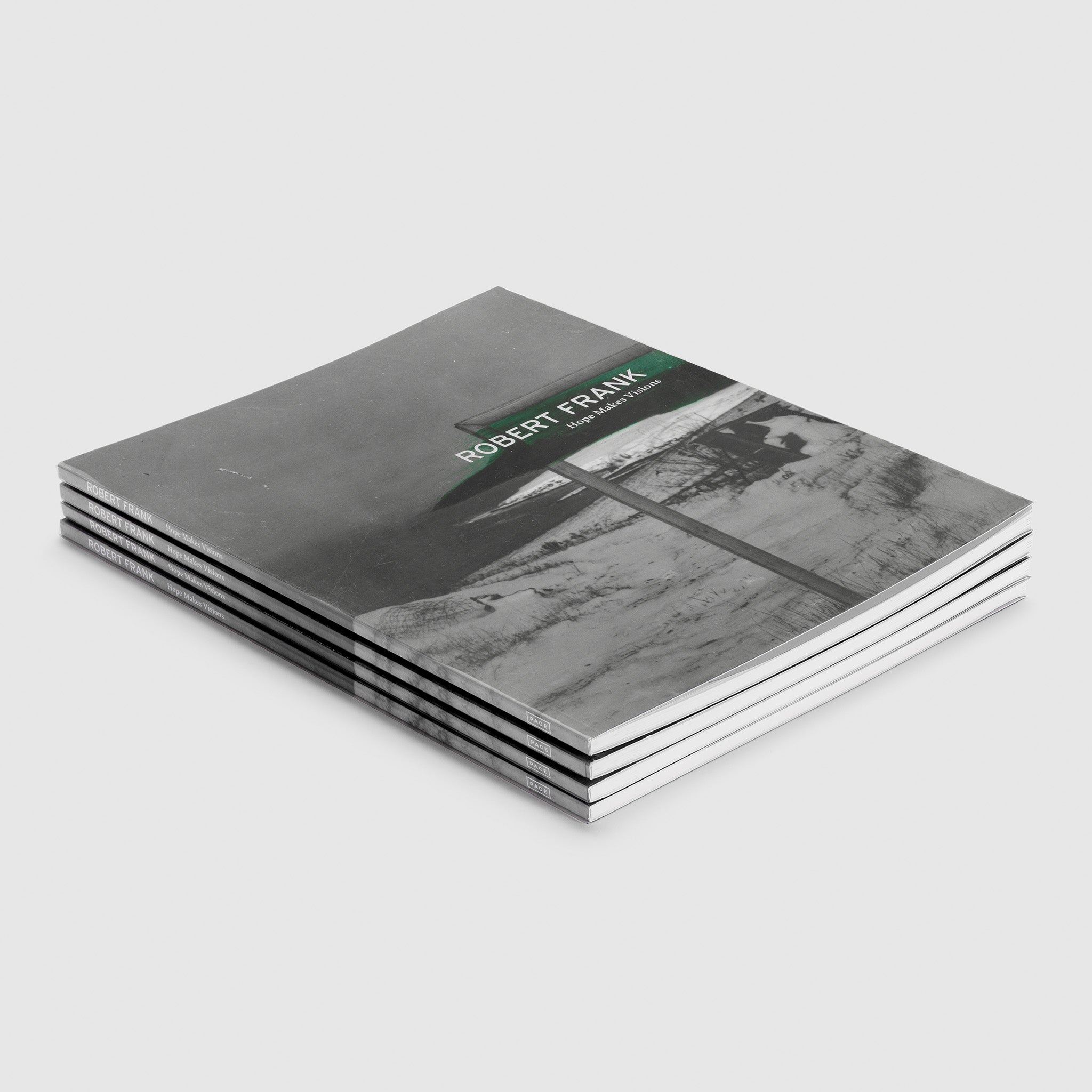 There are four copies of "Robert Frank: Hope Makes Visions" stacked on top of each other.