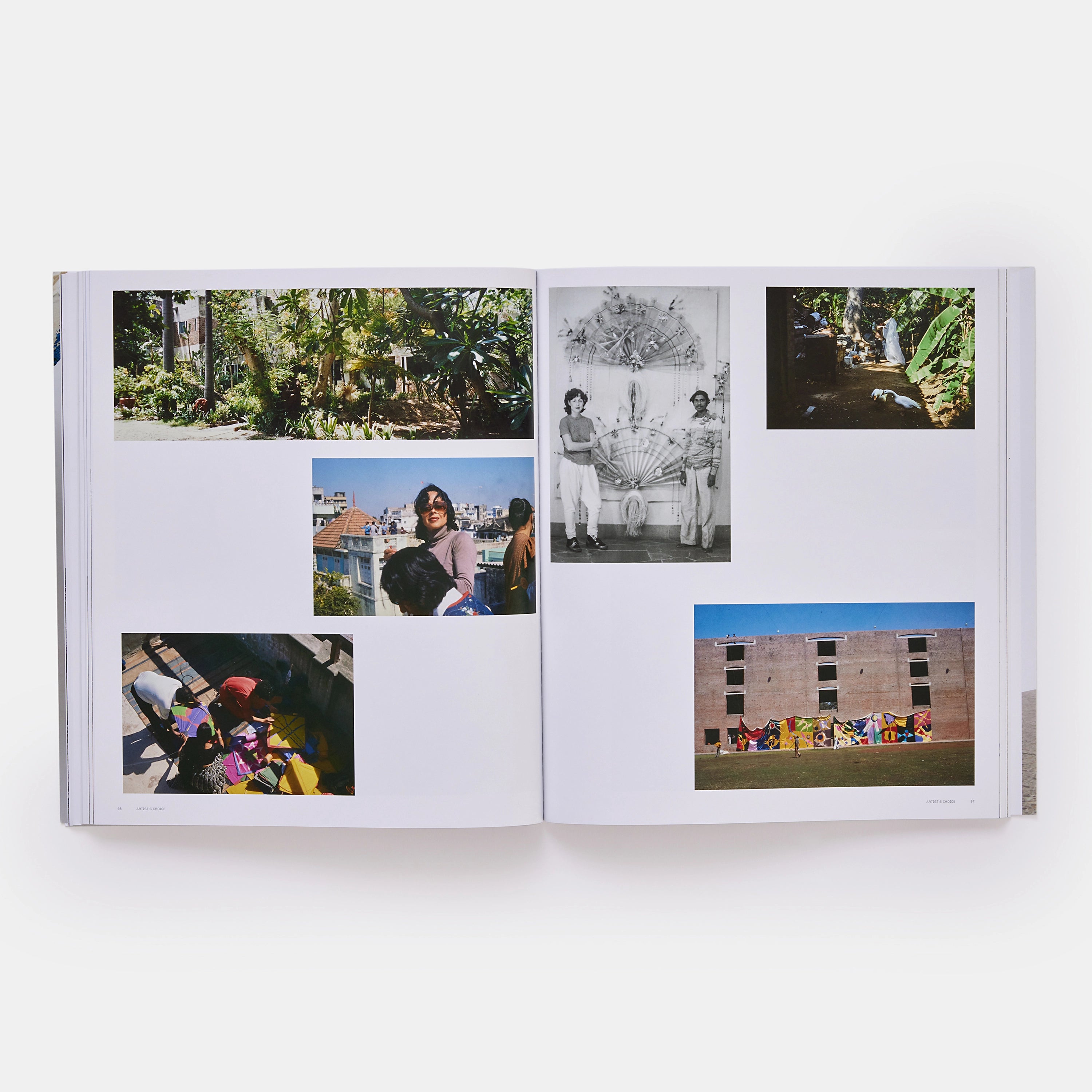 The book is open to two pages. There are six photos across the two pages. One is in black and white.