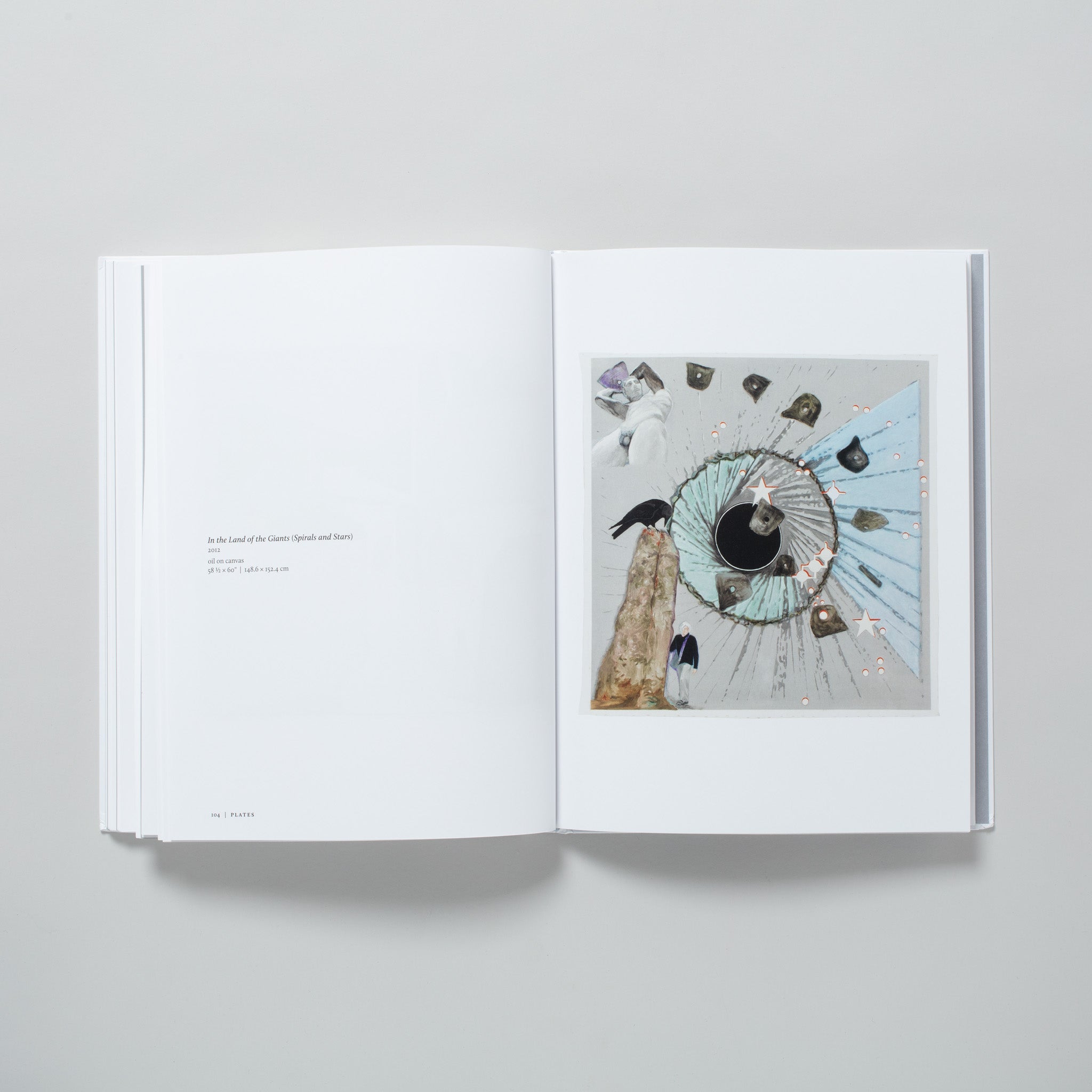 The book is open to two pages. The right has a work by the artist and the left has a description of the work.