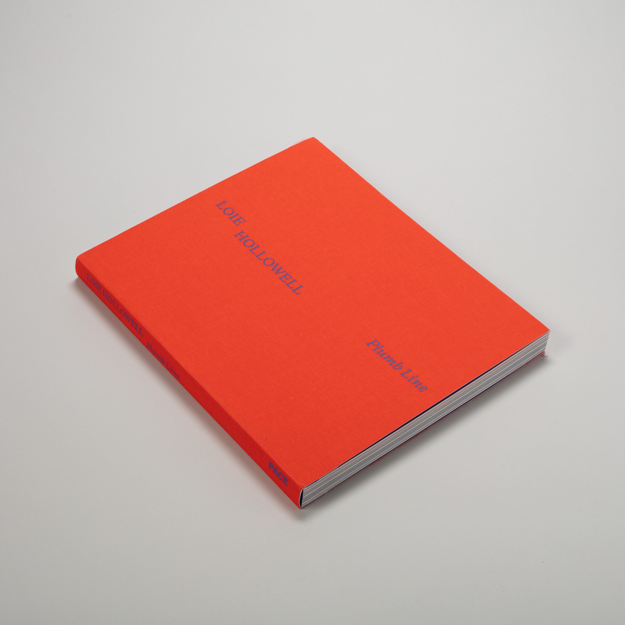 Loie Hollowell Plumb Line. The cover is a bright red orange fabric and the text is blue.