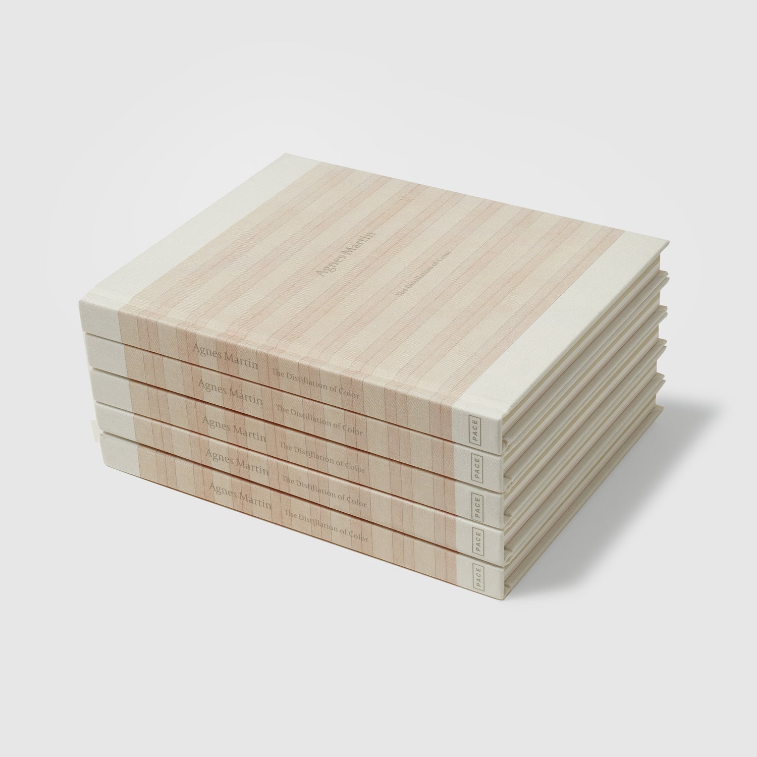 Five copies of Agnes Martin The Distillation of Color are stacked on top of each other. 
