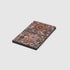 The cover has a colorful Samaras work with beads, jewels, and rainbow circles. The book opens like a box.