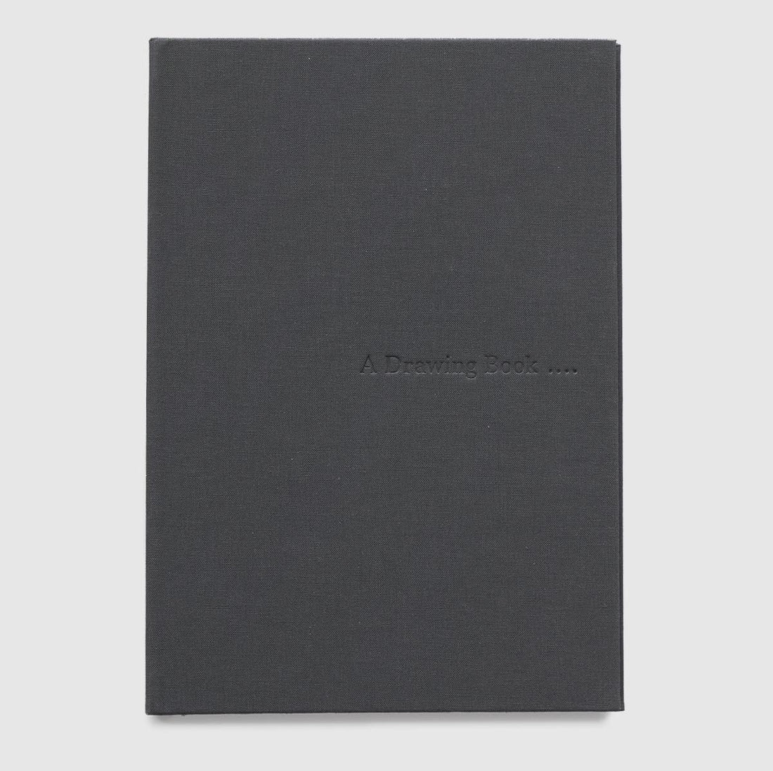 A Drawing Book. The cover is dark grey and the title is stamped into the cover.