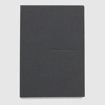 A Drawing Book. The cover is dark grey and the title is stamped into the cover.