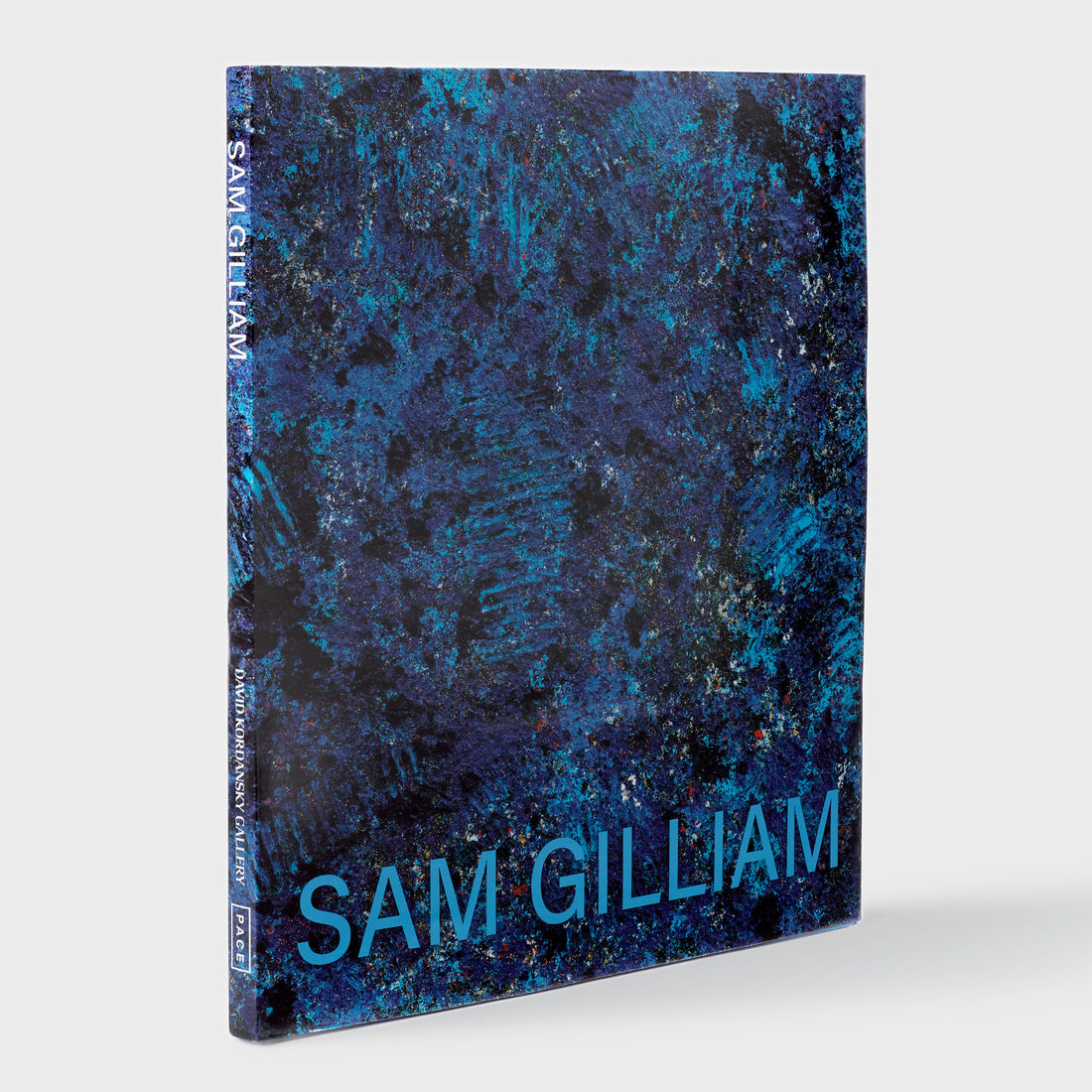 Sam Gilliam. The cover feature an image of a blue work by Gilliam. The font is blue.