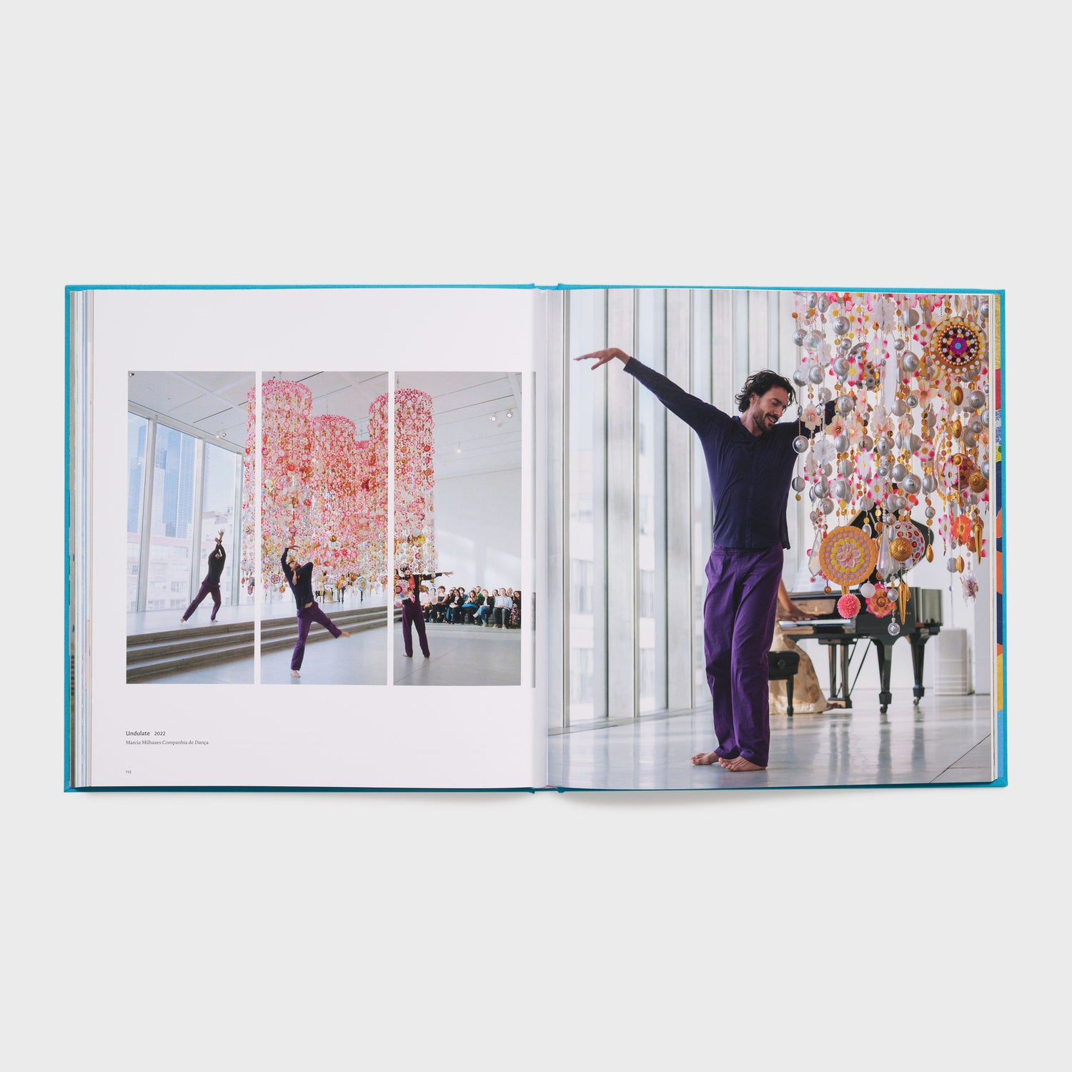 The book is open to two pages. The left has a photo triptych of a dance performance around Milhazes&