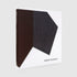Book with black and white geometric design on a gray background