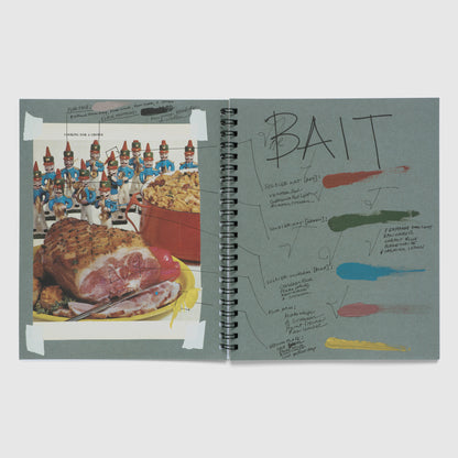 The book is open to two pages. There is a photo of toy soldiers, macaroni and cheese, and a ham that the artist has written over. It looks like the artists notebook.