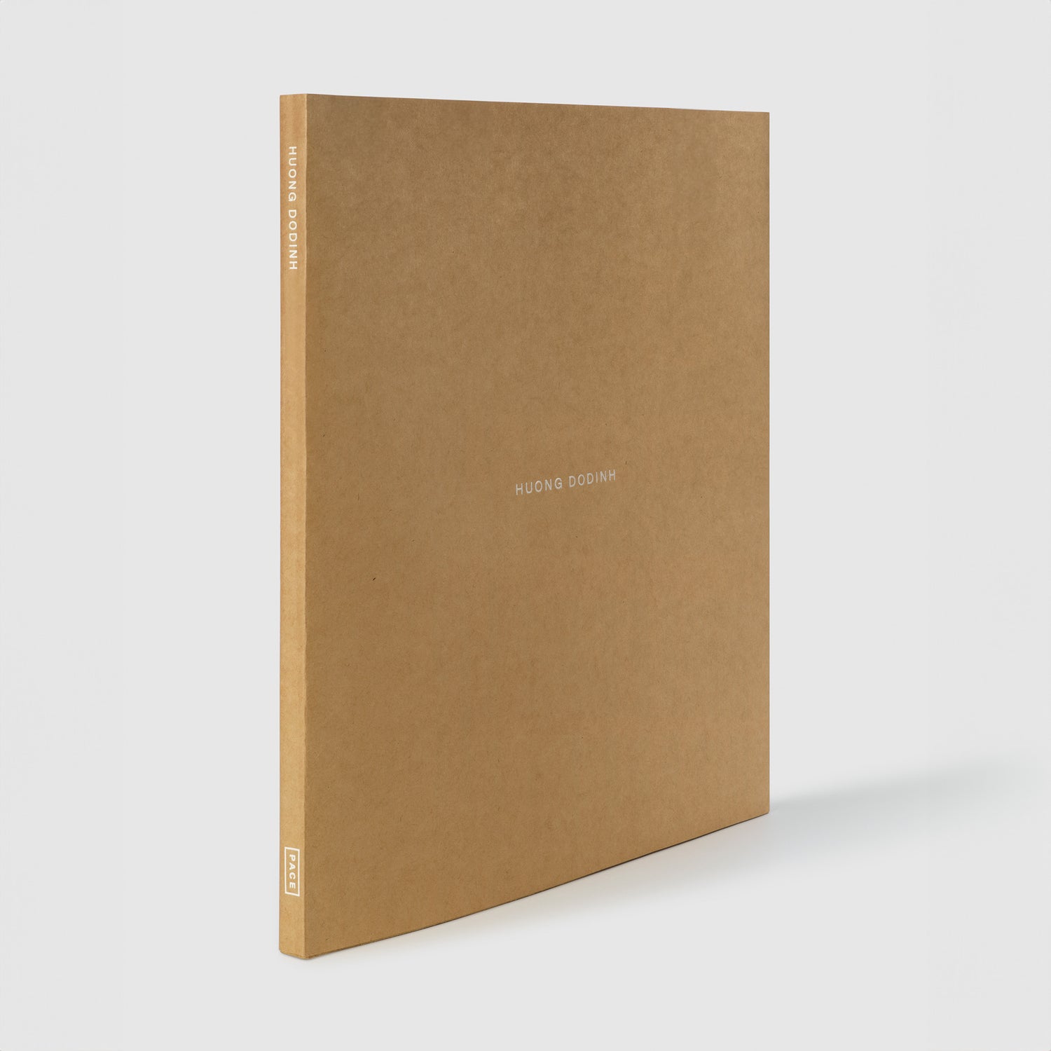 Huong Dodinh. The cover is brown paper.