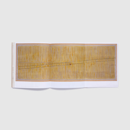 The book is open with a fold out fully unfolded. The foldout is three pages wide and has a Dodinh painting across it.