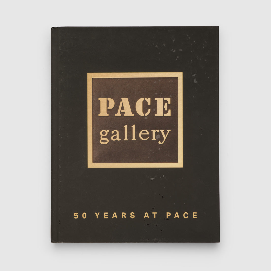 50 Years at Pace by Pace Gallery. Vintage brown color with gold lettering.