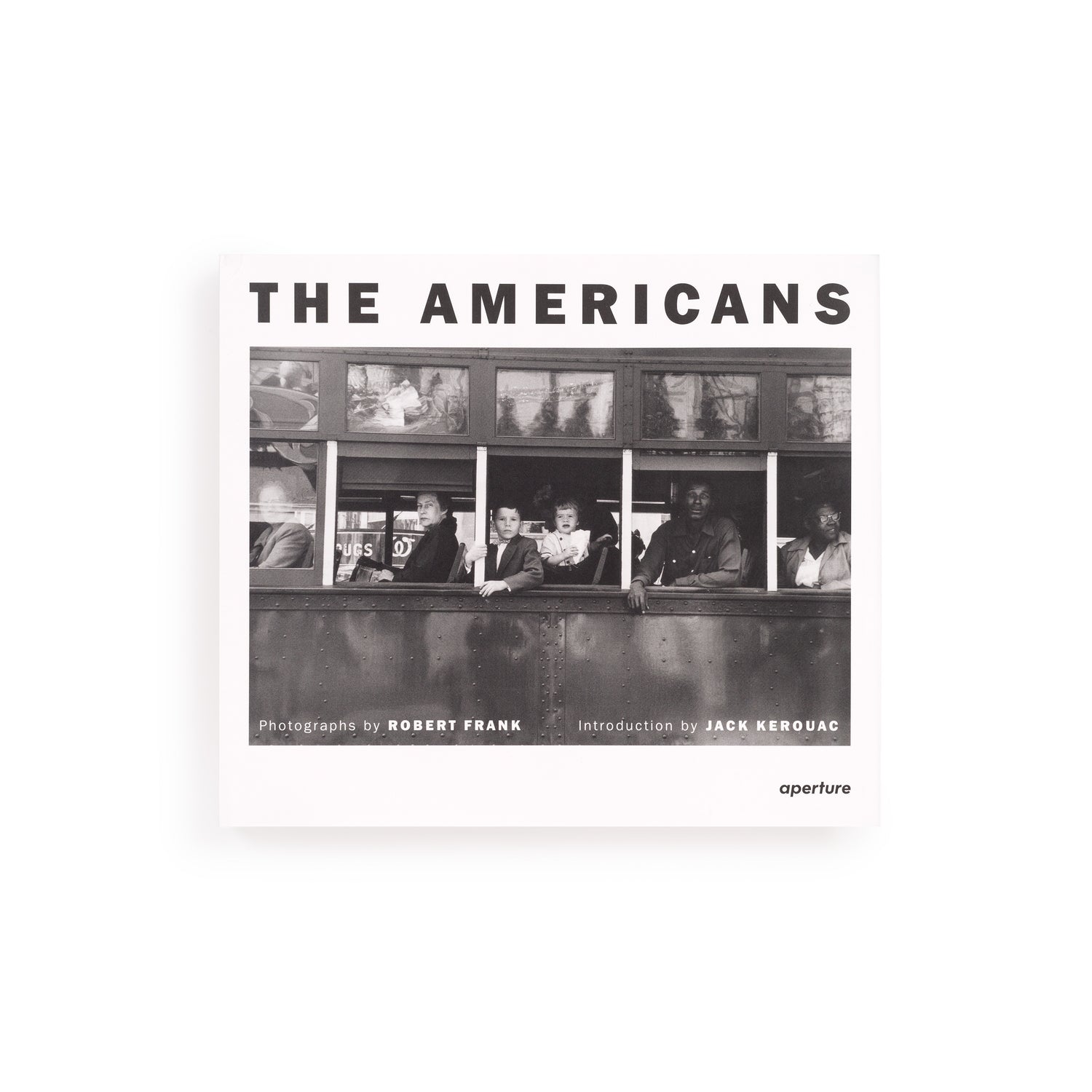 The book cover is white with the title &quot;The Americans&quot; in black letters. There is a black and white photo by Robert Frank on the cover.